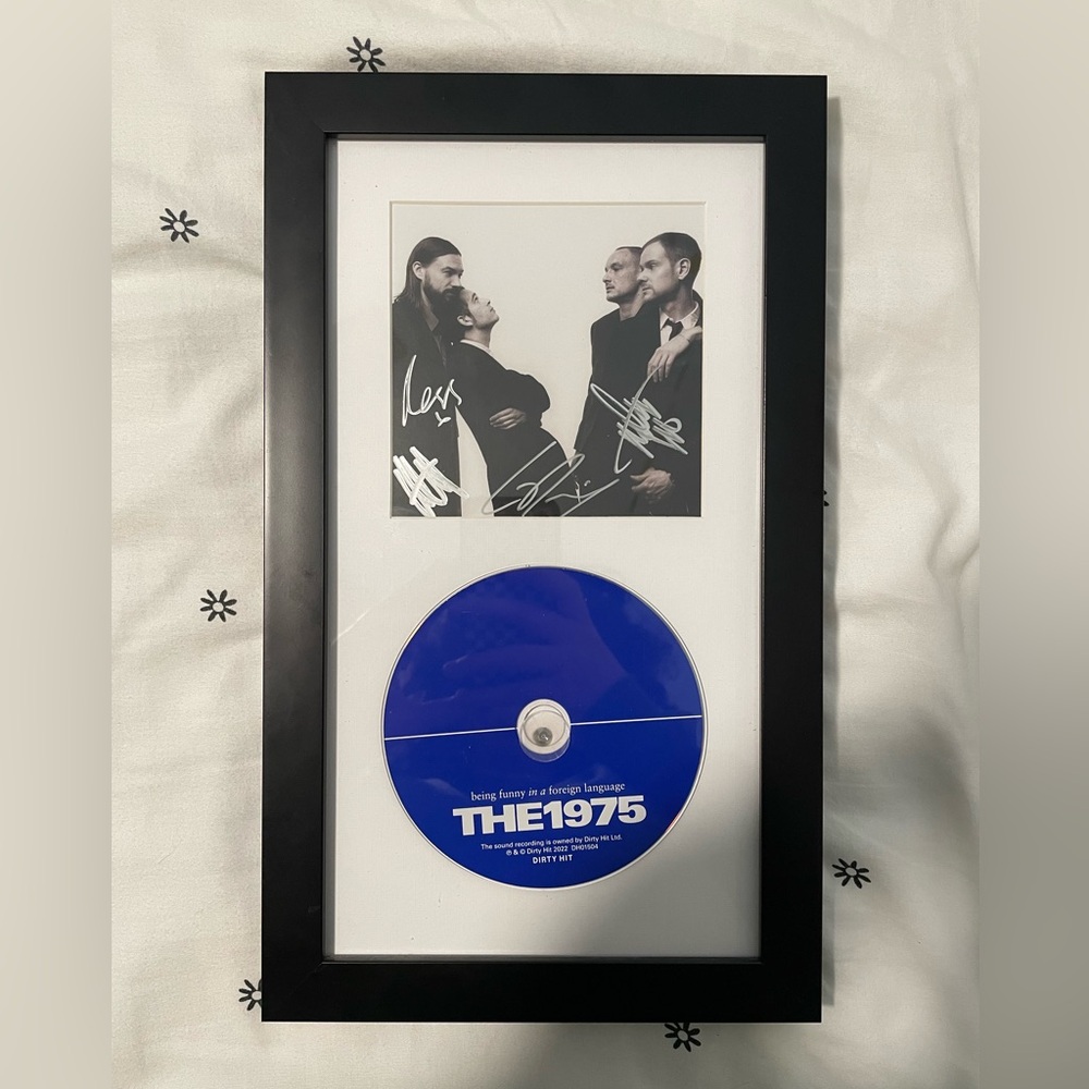 the 1975 signed insert and CD - being funny in a foreign language
